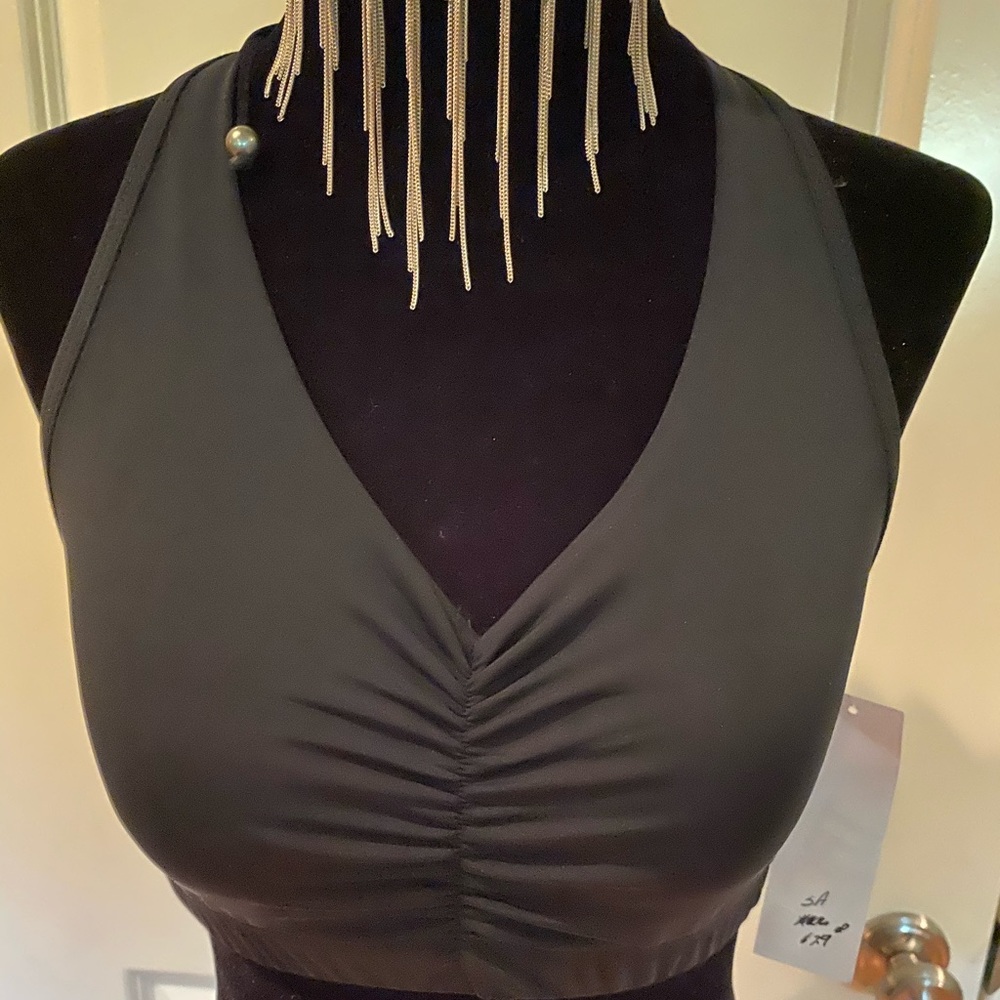 Trendy trends black ruffled back sports bra